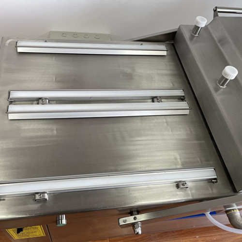 Double chamber vacuum packer four sealing (automatic swing lid)